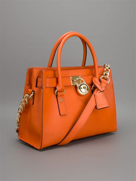 michael kors bommel|michael kors orange bag.